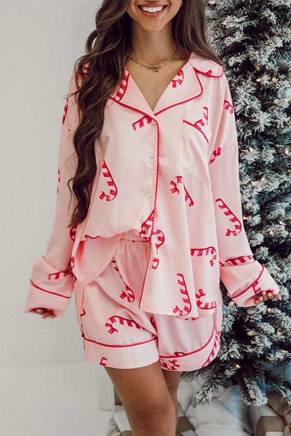 Cozy Up in Style: The Pink Christmas Candy Cane Print Pajama Set