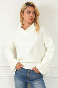 White Expose Seam Turtle Neck Side Slit Oversized Sweater