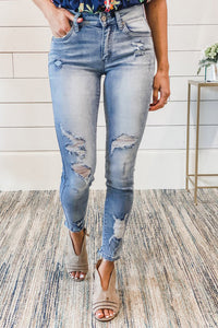 Distressed Mid Rise Jeans