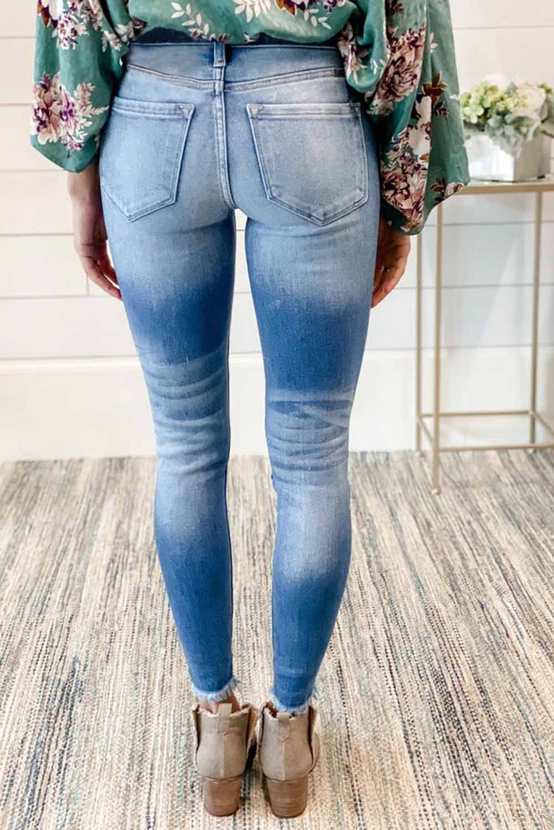 Faded Mid High Rise Jeans with Holes