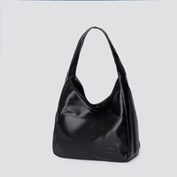 Large capacity tote bag, new black leather simple casual commuting women's bag, fashionable and versatile single shoulder bag