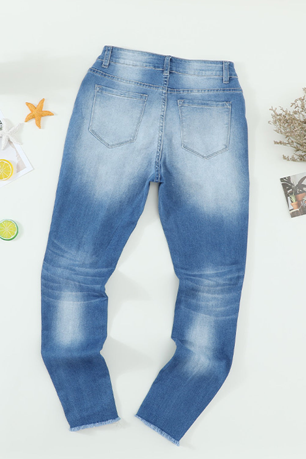 Faded Mid High Rise Jeans with Holes