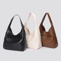 Large capacity tote bag, new black leather simple casual commuting women's bag, fashionable and versatile single shoulder bag