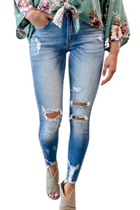 Faded Mid High Rise Jeans with Holes