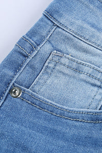 Faded Mid High Rise Jeans with Holes