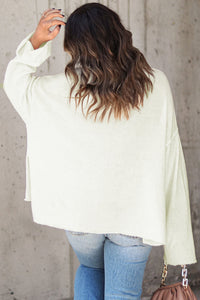 White Expose Seam Turtle Neck Side Slit Oversized Sweater