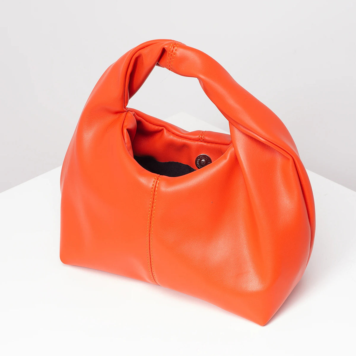 Stylish twist square bag, solid color top clutch bag, simple and versatile commut