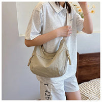 Fashionable and minimalist Korean version dumpling bag, popular this year, new high-quality shoulder bag, large capacity tote cr