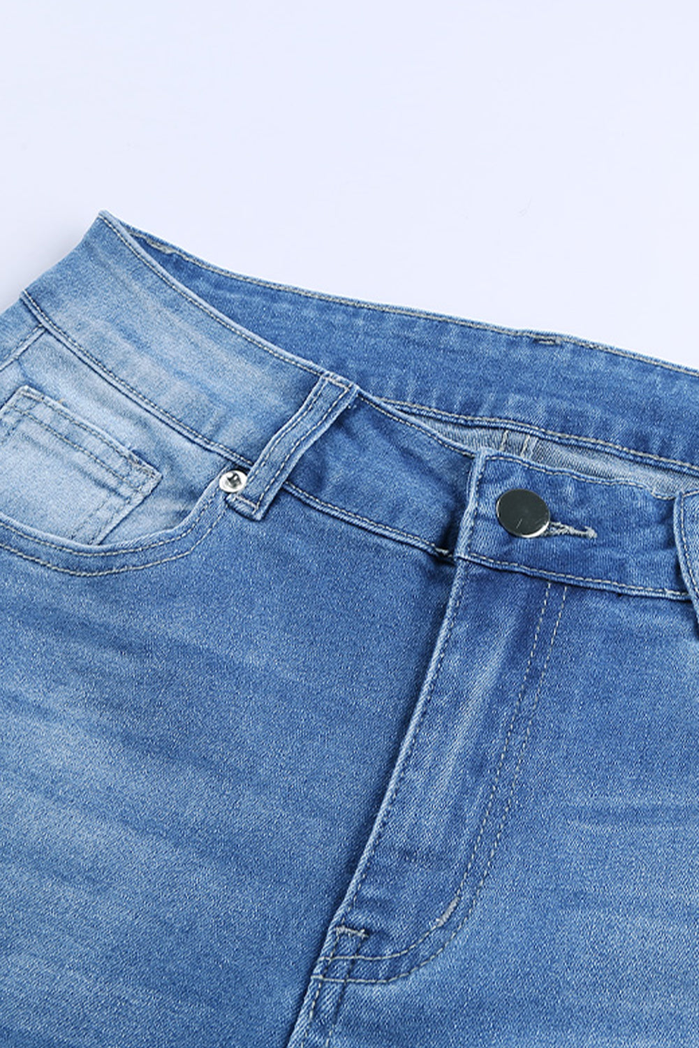 Faded Mid High Rise Jeans with Holes