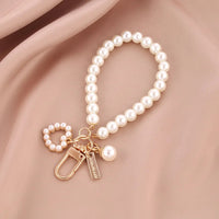 ZAKOL Cute Pearl Keychain for Women Girls Shiny Pearl Bead Shell Phone Bag Backpack Charm Accessory Car Key Key Chain Pendant